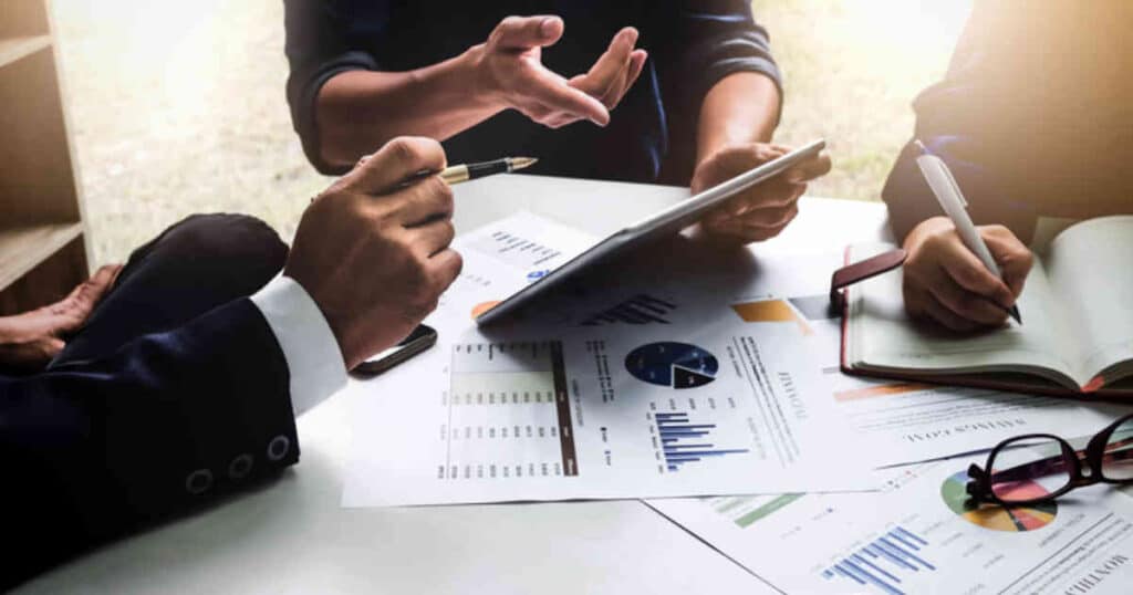 person optimizing costs of hiring employees