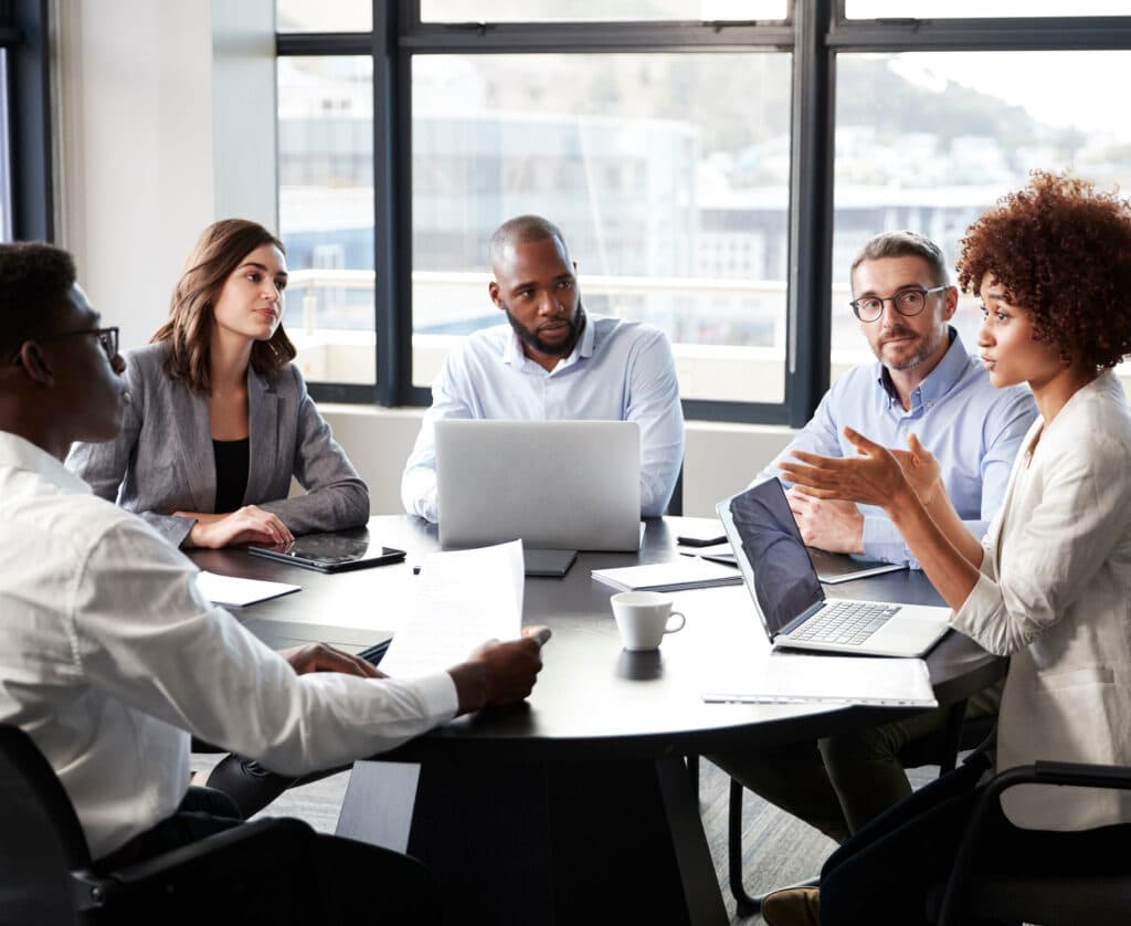 Recruiters meeting on hiring faster procedures including the implementation of a streamlined hiring process