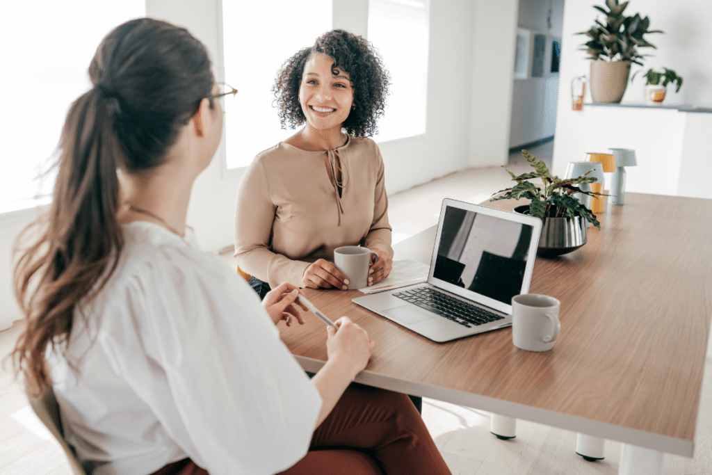 2 woman who are HR employees working together